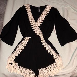 black crochet trim long-sleeve romper